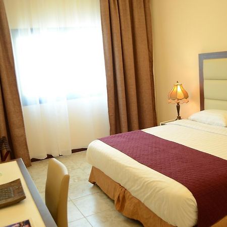 Arcadia Hotel Suites Charjah Extérieur photo