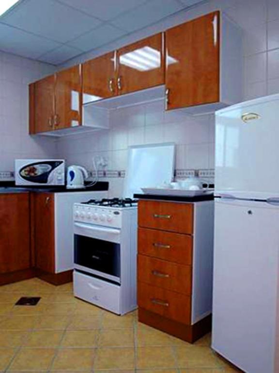 Arcadia Hotel Suites Charjah Chambre photo