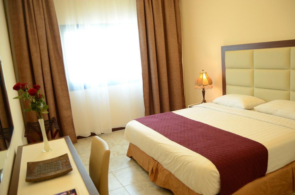 Arcadia Hotel Suites Charjah Extérieur photo