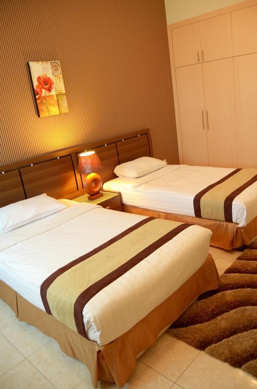 Arcadia Hotel Suites Charjah Extérieur photo